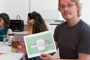 Figure 5: an educator designs and 3D-prints a prototype for a drone while learning about 3D design in a professional development workshop for teachers.