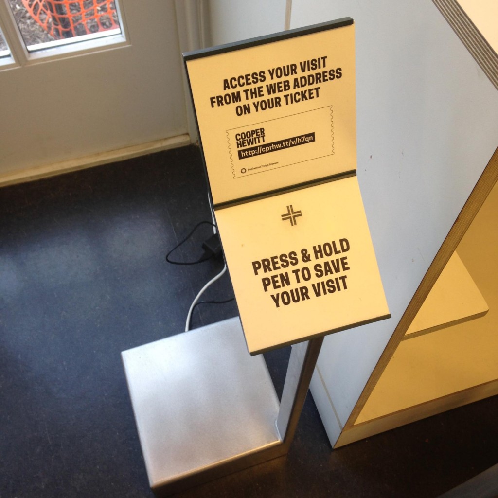 Pen transfer station for visitors to use before they exit the museum.