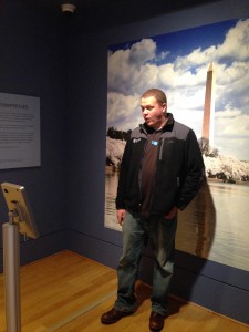 Visitor posing to take a photo using the #NeoImpressed app